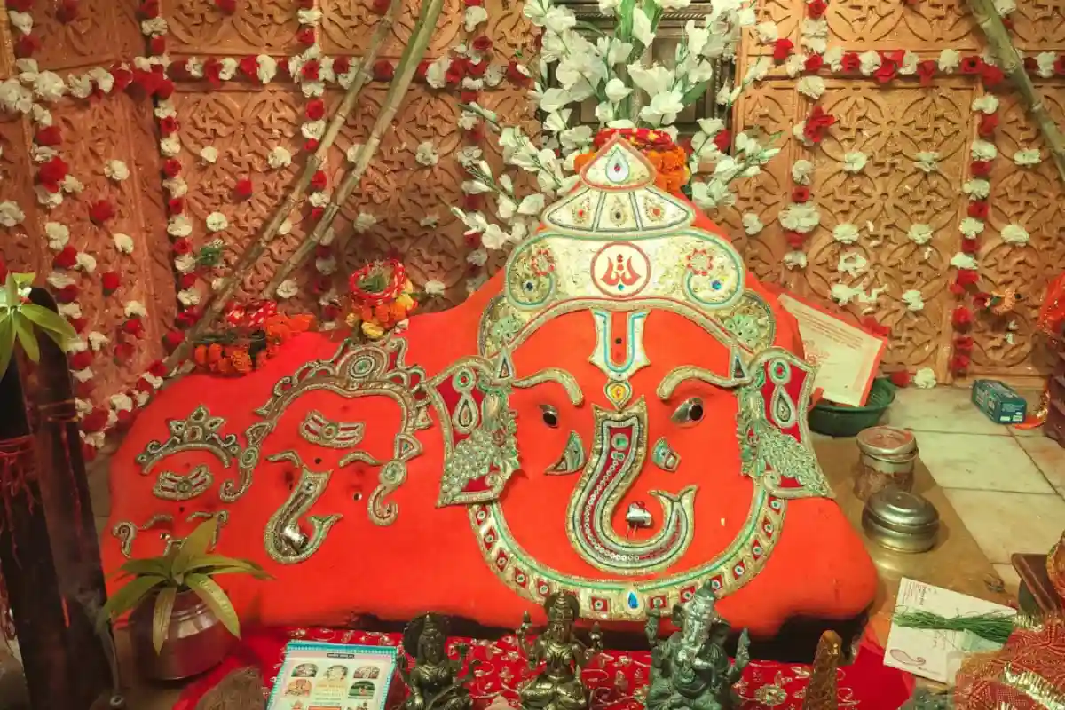 Chintaman Ganesh Temple Ujjain: sanctum housing the three Ganesha idols, Paramara-era carved pillars visible in the mandap