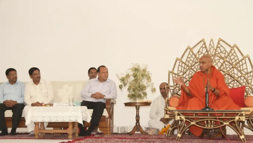 Ujjain Kumbh officials meeting Swami Avdheshanand Giri at Harihar Ashram in Haridwar.